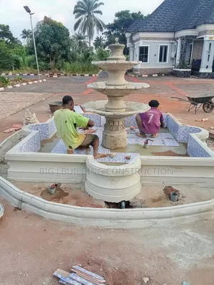 Artwork Fountain Stone and Pool Construction