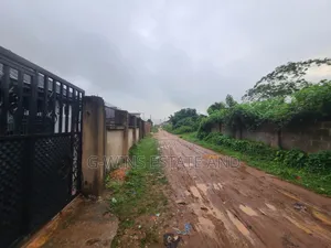 An L-Shaped Land Along Okhuoromi Road Off Airport Road