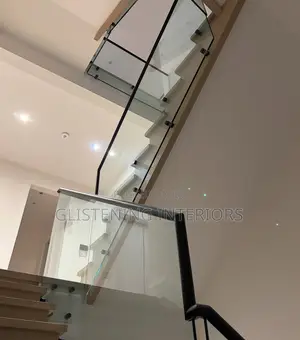Staircase 10mm Plain Tempered Glass With A Black Profile And Stud