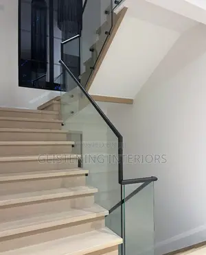 Staircase 10mm Plain Tempered Glass With A Black Profile And Stud