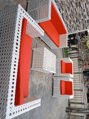 Outdoor White Rattan Chair With Red Cushion