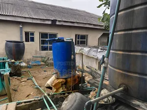 800sqm Plot With a Warehouse Mass Burial Okeafar Isolo Ejigbo Rd