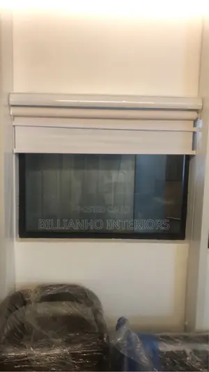 Blackout and Sunscreen Roller Blinds in One Window