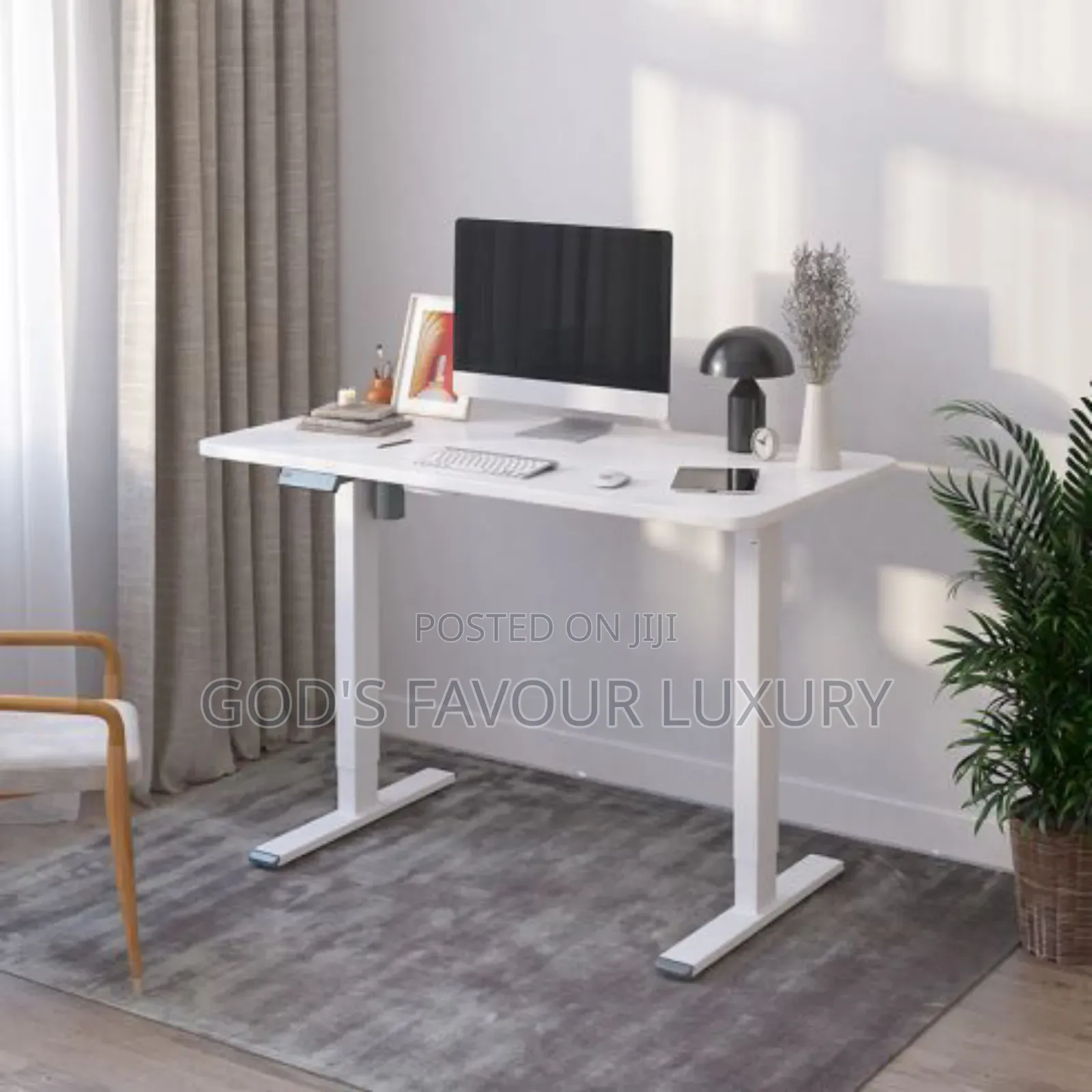 Motorised Adjustable Height Computer Desk.