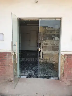 Frameless 10mm Tempered Glass Shop Entrance Door In Lagos