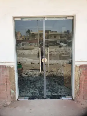 Frameless 10mm Tempered Glass Shop Entrance Door In Lagos