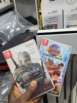 Clean Nintendo Switch Oled With 2 Games