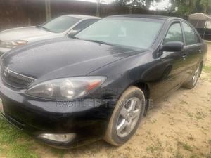 Toyota Camry SE 4rd Sedan (2.4L 4cyl 5M) 2004 Black in Ajah - Cars