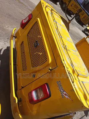 Bajaj RE 2022 Yellow