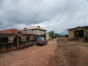 14,233.385sqm Fenced Land With Structures for Sale at Awoton