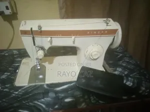 An Electric and Manual Sewing Machine With Motor