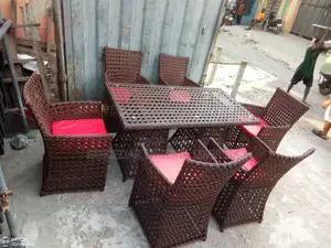 Outdoor Chairs and Glass Table 