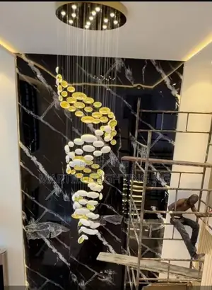 Modern Void and Staircase Chandelier Light Unique and Classy