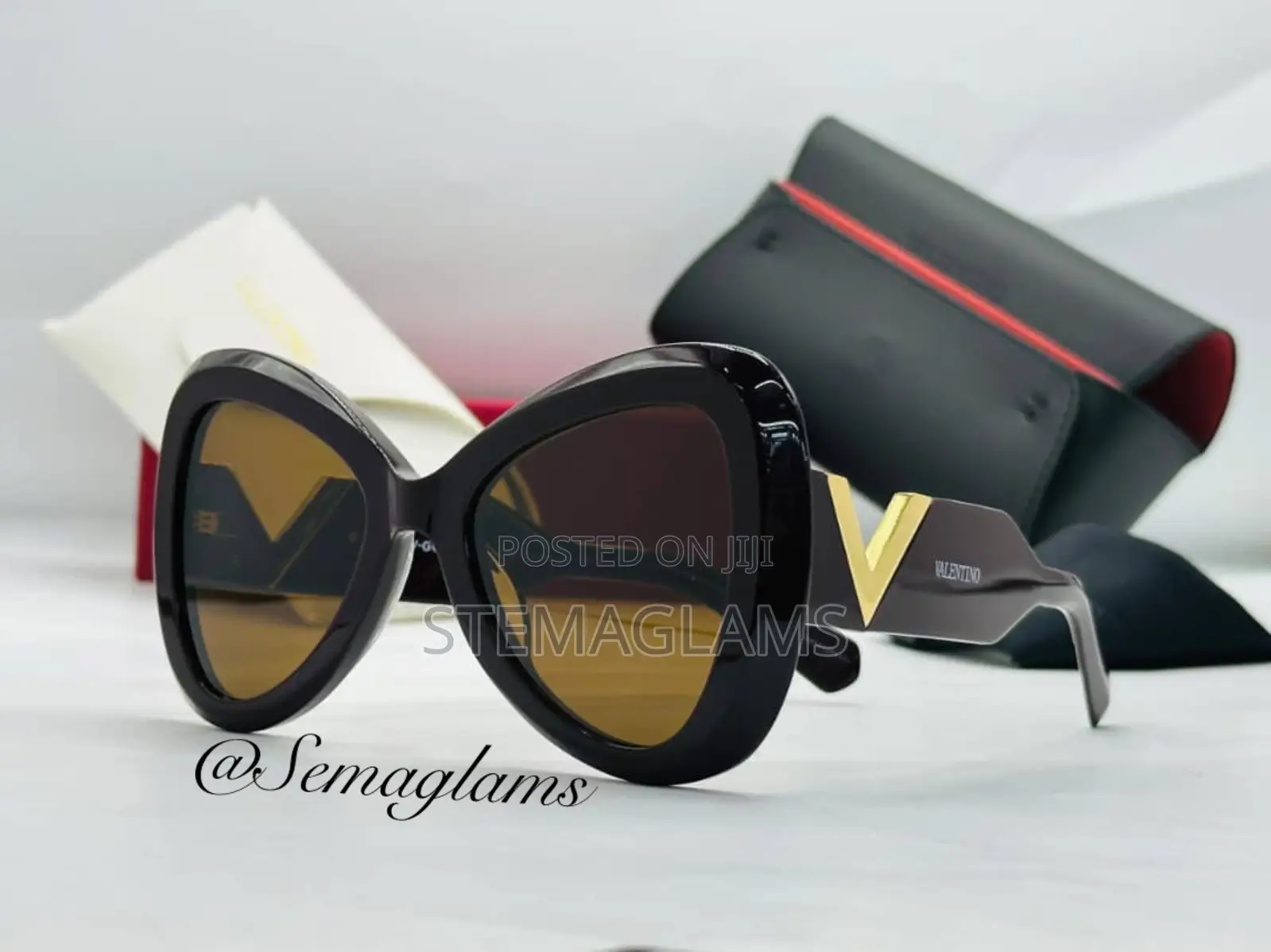 Valentino Eyewear Sunglasses, Distinctive Shape With a Cat-Eye Twist