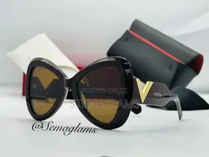 Valentino Eyewear Sunglasses, Distinctive Shape With a Cat-Eye Twist