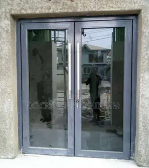 Luxury Aluminium Glass Swing Door – Lagos Installation