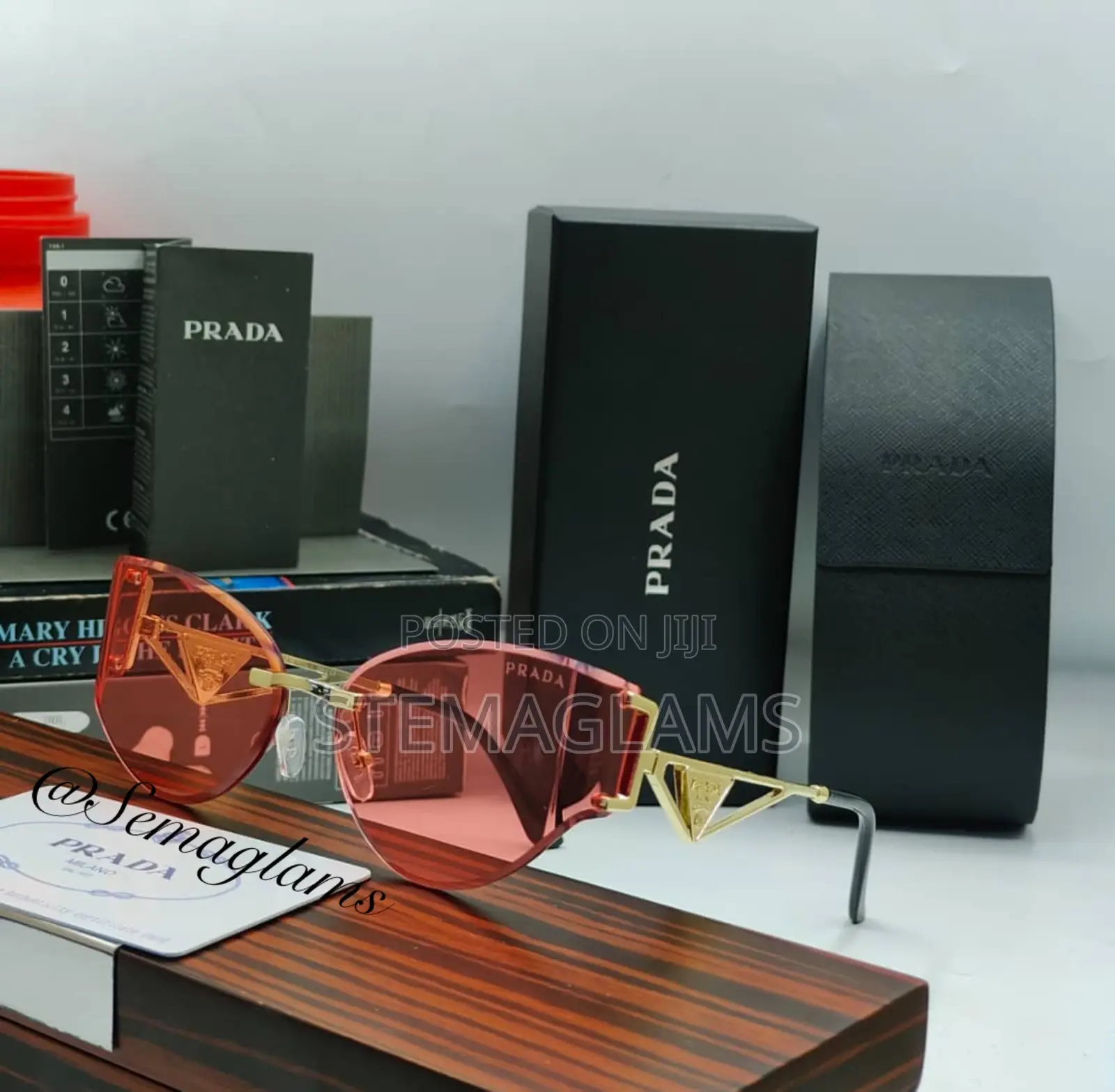 Prada Metal Frame Rimless Eyeglasses