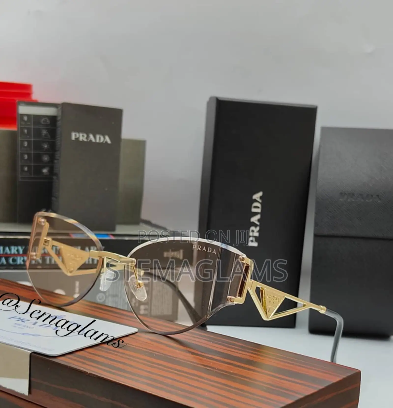 Prada Metal Frame Rimless Eyeglasses