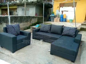 Dark Gray L Shape Sofas and a Single Sit