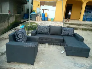 Dark Gray L Shape Sofas and a Single Sit