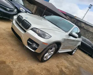 BMW X6 xDrive35i 4x4 Coupe (3.0L 6cyl 8A) 2011 Gold