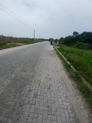 Land Measuring 1,400sqm Facing Tarred Road at Sangotedo