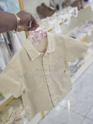 Short-Sleeved, Button-Up Shirt in a Light, Neutral Color