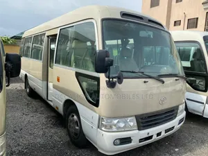 Toyota Coaster 2017 Gold
