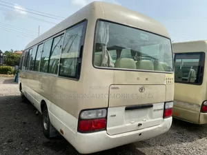 Toyota Coaster 2017 Gold