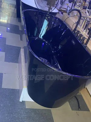 Black Bathtub With Inbuilt Mixer Tap.