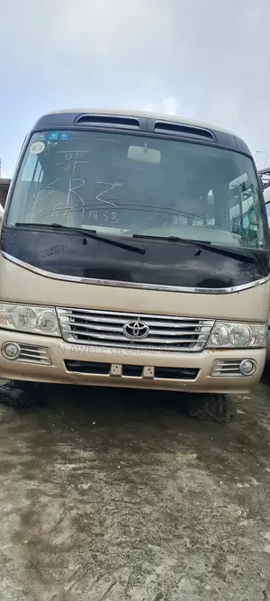 Toyota Coaster 2013 Gold