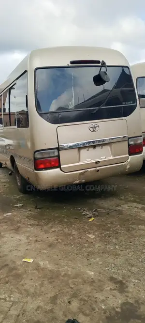 Toyota Coaster 2013 Gold