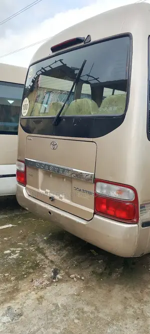 Toyota Coaster 2013 Gold