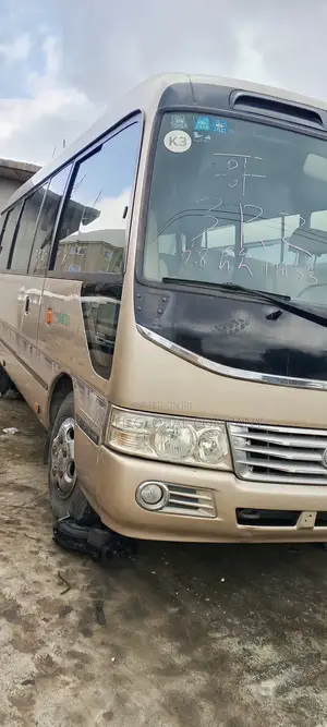Toyota Coaster 2015 Gold