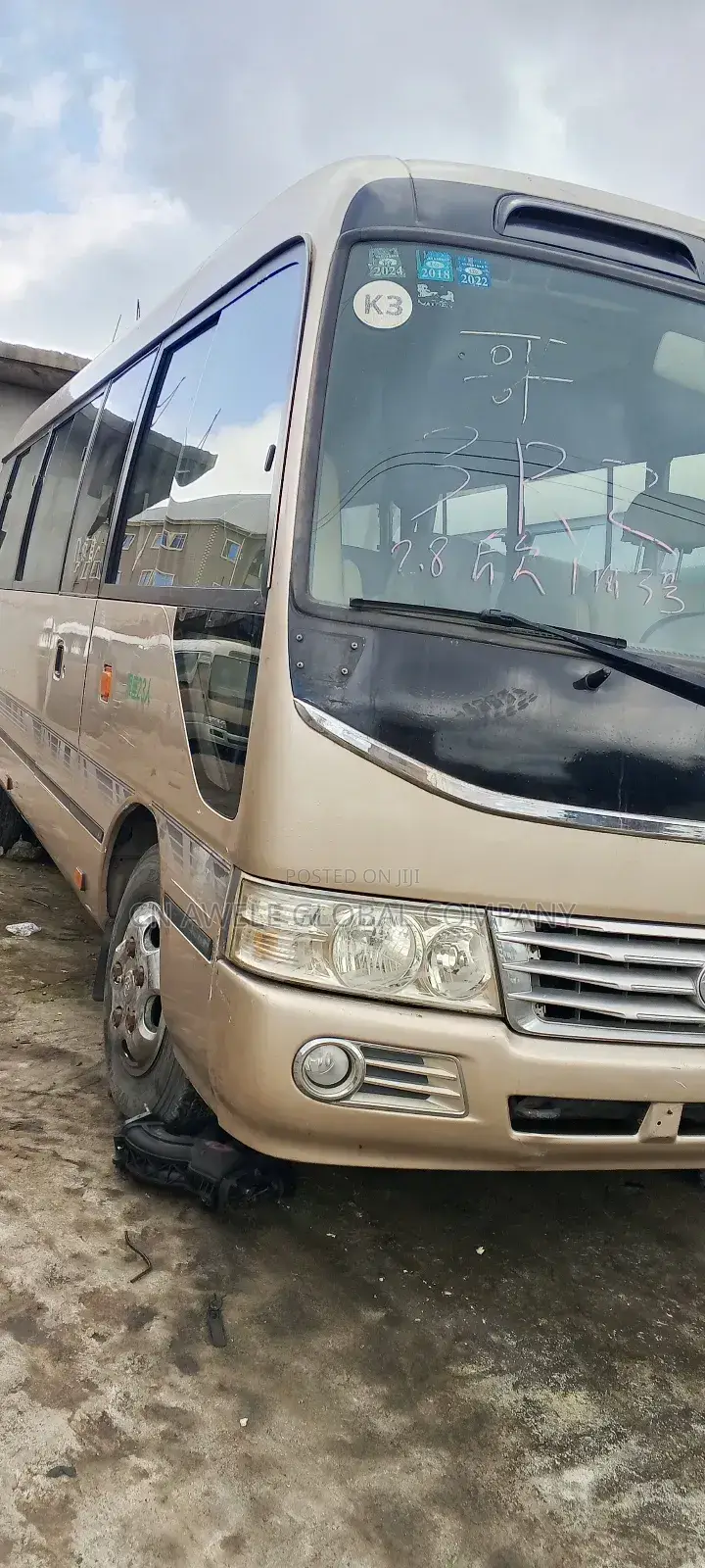 Toyota Coaster 2015 Gold