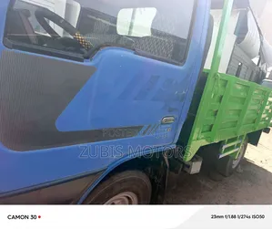 Nissan Cabstar 4 Tire Petrol Engine Blue Color
