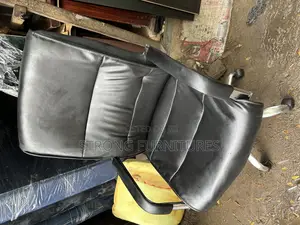 Tokunbo Chair