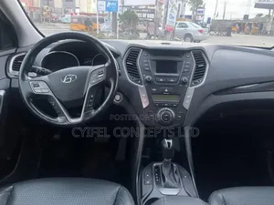 Hyundai Santa Fe Limited 4dr SUV AWD w/Saddle Interior (3.3L 6cyl 6A)