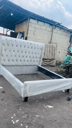 Elegant, Upholstered 6 by 6 Bedframe
