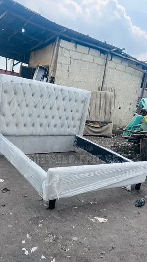 Elegant, Upholstered 6 by 6 Bedframe