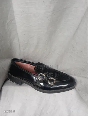 Black Leather Monk Strap Loafers.
