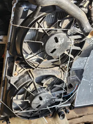 Radiator and Fan For. Ford Escape. /. 010