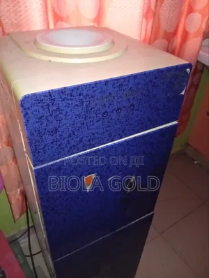 Cool Wave Water Dispenser With Freezer Compartment