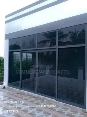 Dark Grey Glass Partition With Swing Door