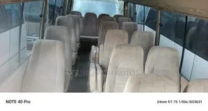 Toyota Coaster 2015 Gold