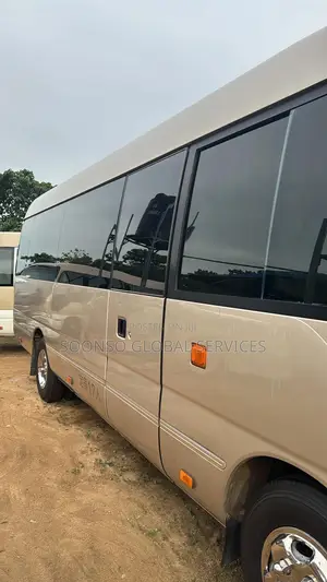 Toyota Coaster 2018 Gold