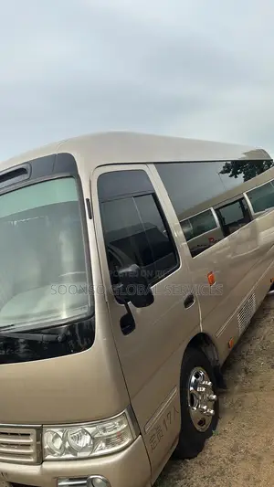 Toyota Coaster 2018 Gold