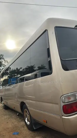 Toyota Coaster 2018 Gold