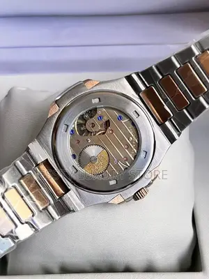 Patek P Nautilus 5712 Blue Dial Moon Phase Two Tone