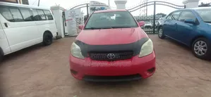 Toyota Matrix Hatchback AWD (1.8L 4cyl 4A) 2006 Red